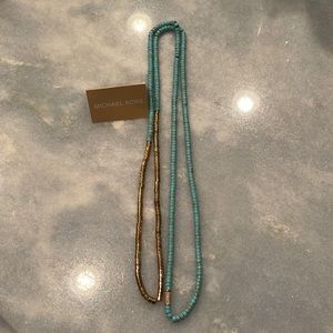 Michael Kors 24” Turquoise necklace with semi-precious stones. Can be layered.